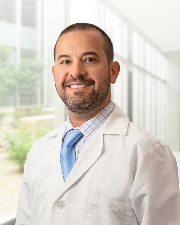 Dr. Carlos Gomez-Meade